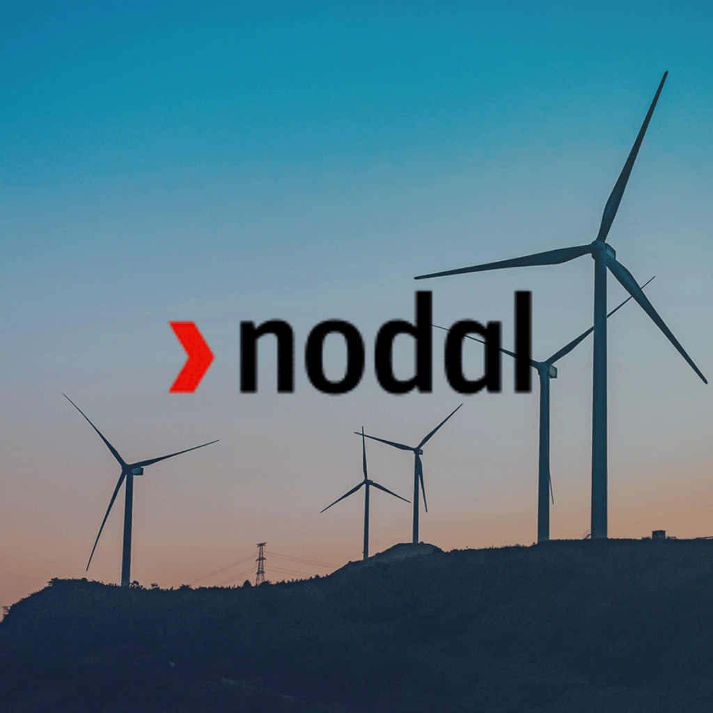 Row of windmills set against orange and blue sunset with Nodal logo overlay