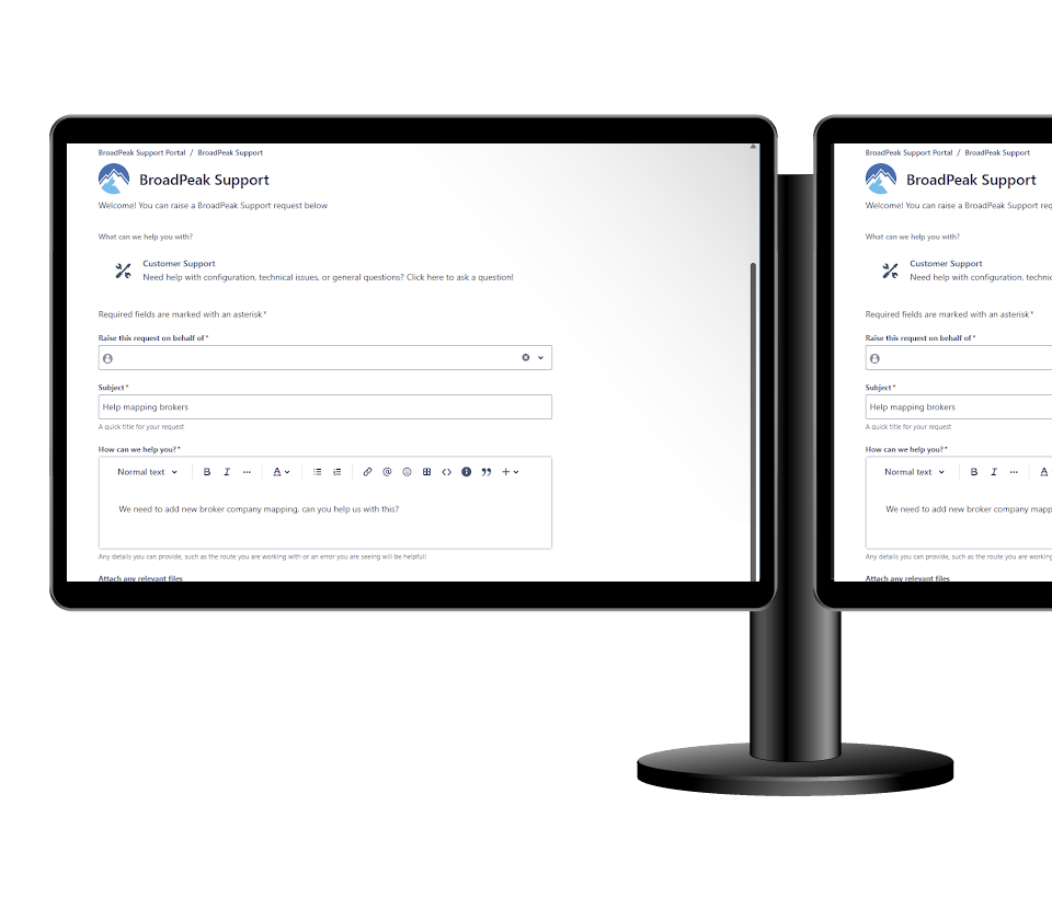 Dual computer screens showing BroadPeak's support portal