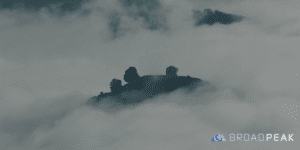 mountain with unknown terrain due to clouds