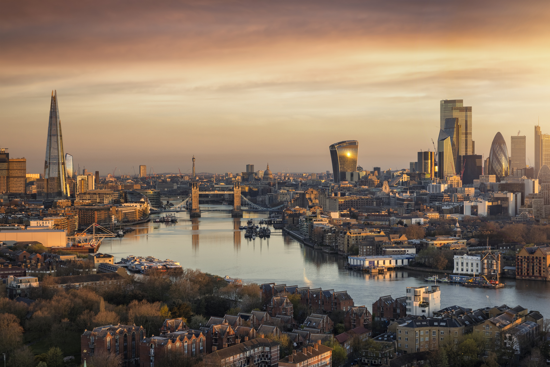 Panoramic, aerial view to the urban skyline of London during a golden