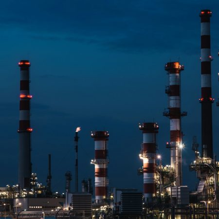 maksym-kaharlytskyi-u13zBF4r56A-unsplash Towers from oil refinery at night